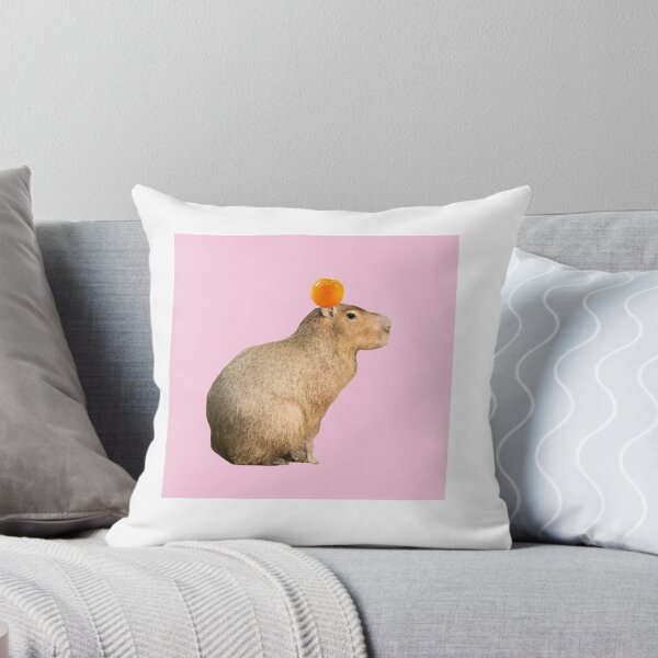 Item preview, Capybara with Orange on Head Pink Background designed and sold by GeekyGirlsGarb.
