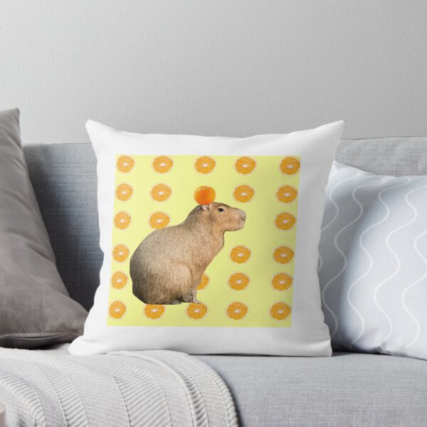 Item preview, Capybara With Orange On Head Yellow Background designed and sold by GeekyGirlsGarb.