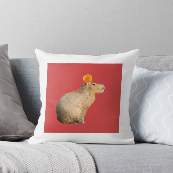 Item preview, Capybara with Orange on Head Red Background designed and sold by GeekyGirlsGarb.
