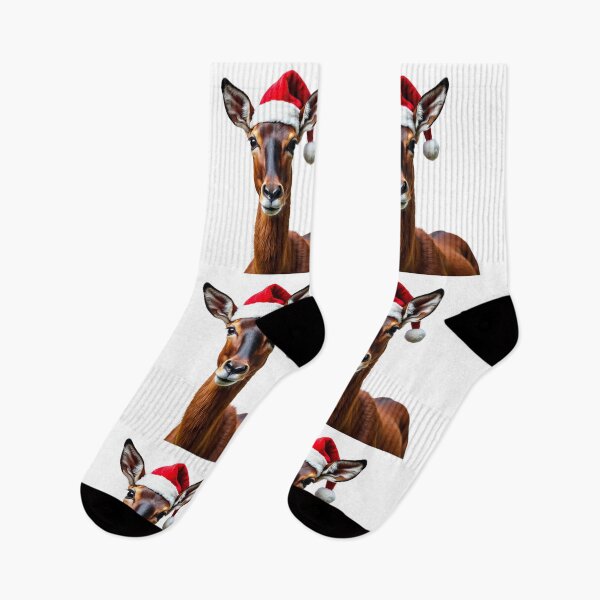 Item preview, Funny Saola Wearing Christmas Hat designed and sold by LazyOwlStore.