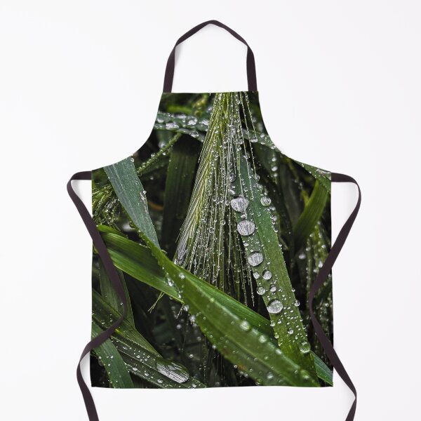 Item preview, Close-up view of green grass blades with raindrops designed and sold by PavlinaBFDesign.