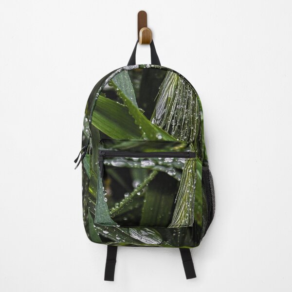 Item preview, Close-up view of green grass blades with raindrops designed and sold by PavlinaBFDesign.