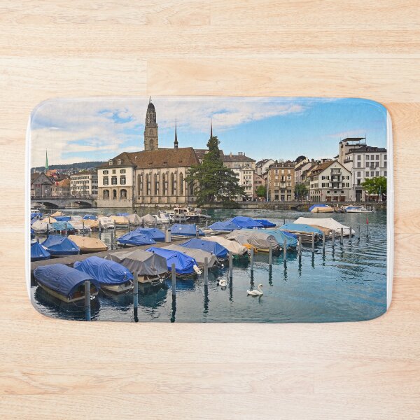 Item preview, Historic Zurich city center with famous Grossmunster churh and boats on the river Limmat, Switzerland designed and sold by goceris.