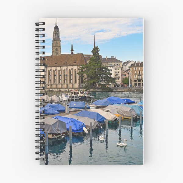 Item preview, Historic Zurich city center with famous Grossmunster churh and boats on the river Limmat, Switzerland designed and sold by goceris.