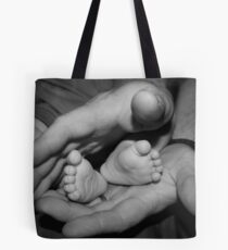 in his hands Tote Bag