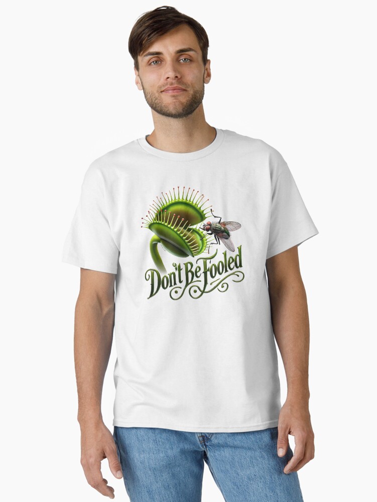 Thumbnail 1 of 7, Classic T-Shirt, Don't be fooled T-Shirt designed and sold by zeeteezofficial.