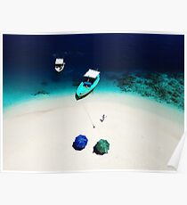 A drone shot of a lady walking on the beach and two boats moored next to a sand bank island in Maldives Poster