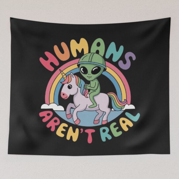 Item preview, alien riding unicorn above a rainbow with a colorful text around it " Humans aren't real " designed and sold by 123ks.