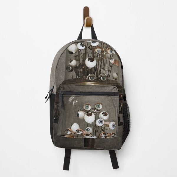 Item preview, Antique blown glass doll eyes, inside a glass bell, on a metal table designed and sold by Cinzia Murgia.