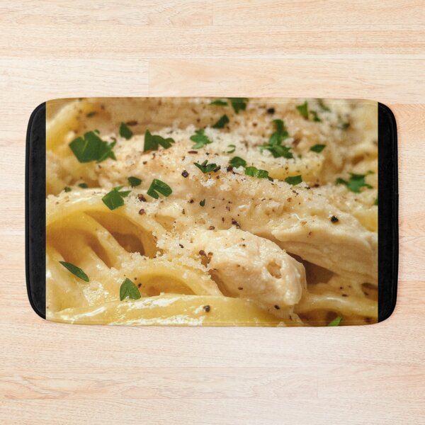 Item preview, Creamy pasta with chicken and herbs prepared in a rustic kitchen on a sunny afternoon. designed and sold by Jerhus.