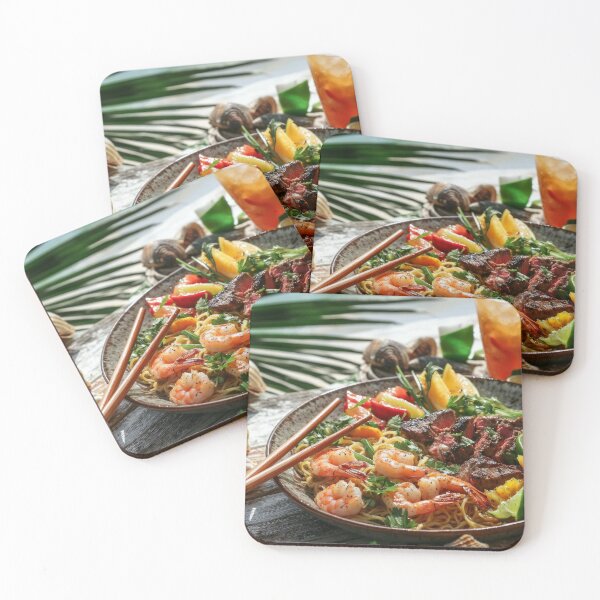 Item preview, Fresh seafood and grilled steak served on a tropical beach with vibrant vegetables and a refreshing drink in the afternoon sun. designed and sold by Jerhus.