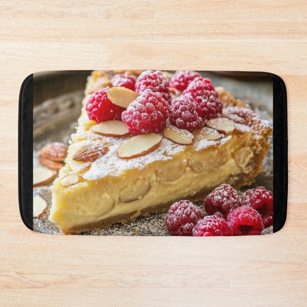 Item preview, Delicious almond tart topped with fresh raspberries and powdered sugar on a rustic table. designed and sold by Jerhus.