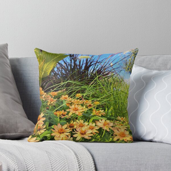 Item preview, Lush flowers and green grass against blue sky in beautiful outdoor setting low veiw designed and sold by Jacobs-Media.