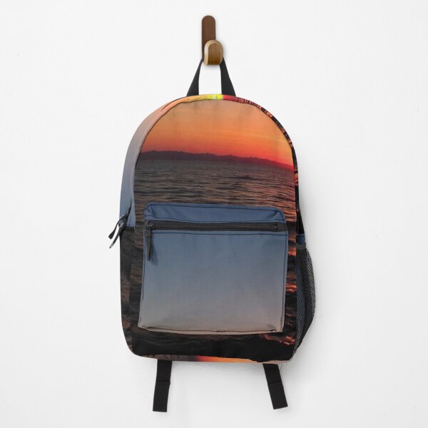 Item preview, a sunset over the ocean with a sun shining through the clouds. designed and sold by Omar-mo24.
