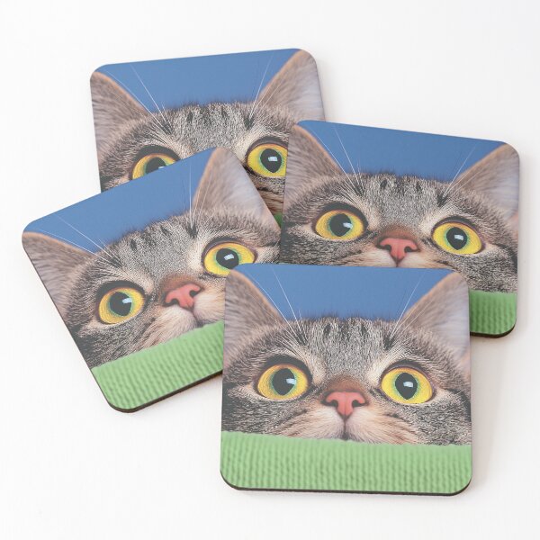 Item preview, Curious Cat with Wide Eyes: A playful tabby cat peeks over a green surface with wide, captivating eyes, radiating curiosity and mischief. designed and sold by tamtana.
