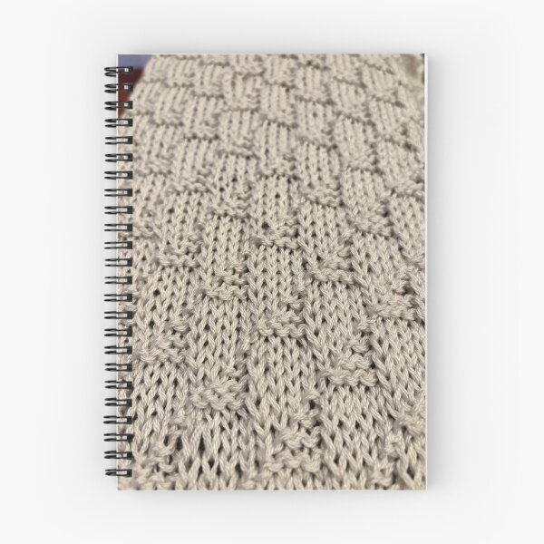 Item preview, knit blanket using a triangle pattern designed and sold by thebentknitter.