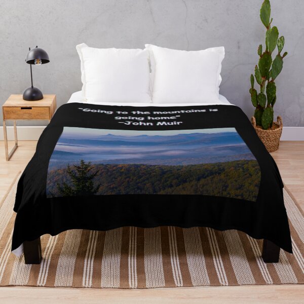 Item preview, "Going to the mountains is going home" -John Muir designed and sold by Planet Agora.