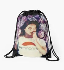 Lana Laying in Flowers Drawstring Bag