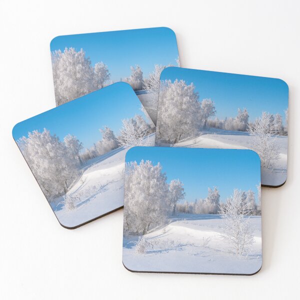 Item preview, Panorama of frost-covered trees against a blue sky background designed and sold by Klyakhin.