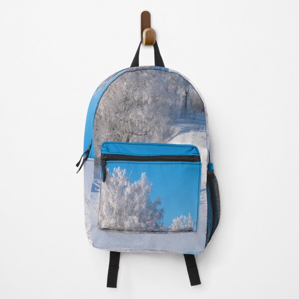 Item preview, Panorama of frost-covered trees against a blue sky background designed and sold by Klyakhin.