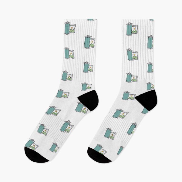 Item preview, Simple doodle of film roll with mountain scene designed and sold by rasagamastore.
