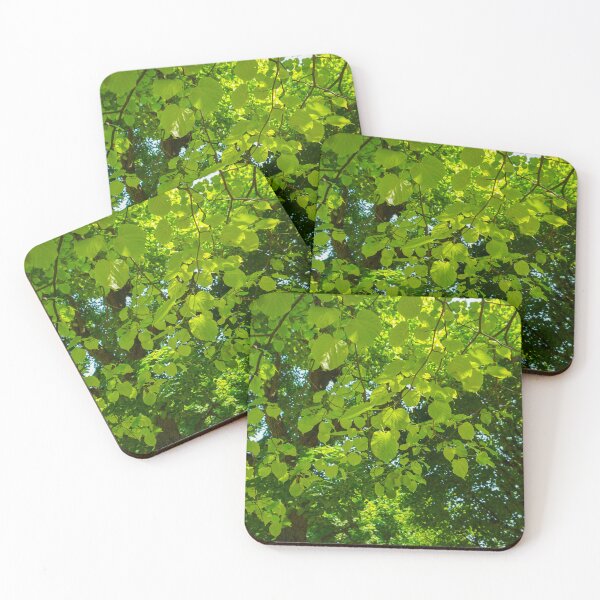 Item preview, Green leaves on trees with sunshine on them designed and sold by dabingboshi.