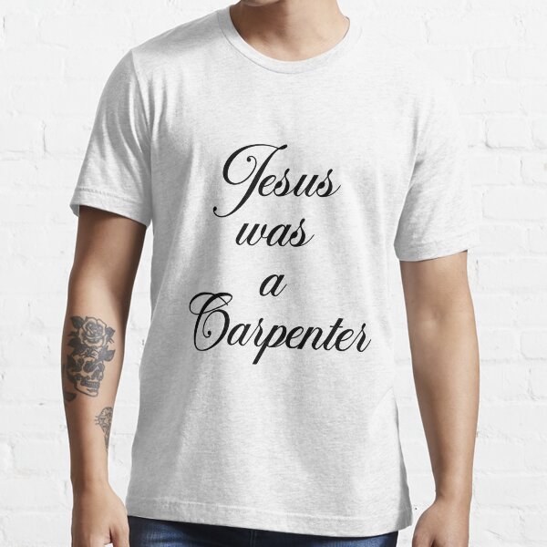 Vista previa del artículo con la obra «Camiseta clásica del festival de música divertida Jesús era carpintero», diseñado y vendido por MousajidouArt.