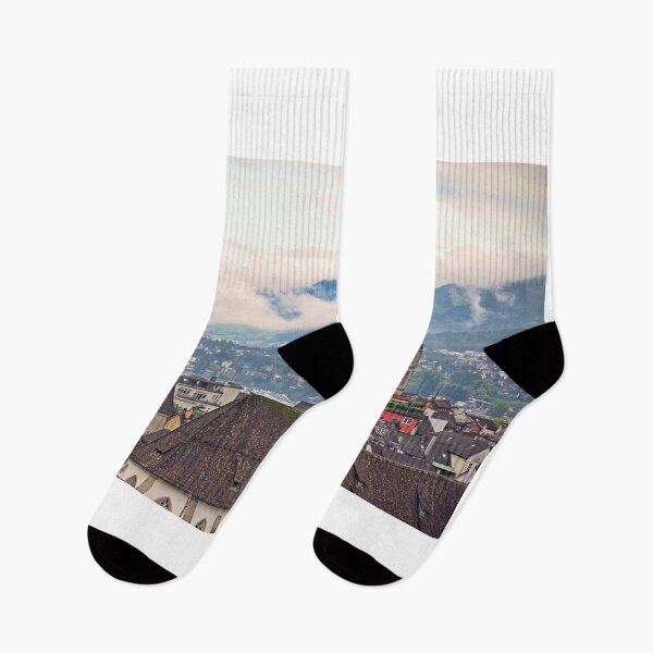 Item preview, Church clock towers in Zurich skyline, cloudy morning designed and sold by goceris.