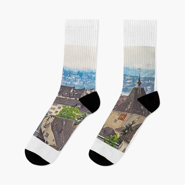 Item preview, Church clock towers and old houses in Zurich skyline, cloudy morning designed and sold by goceris.