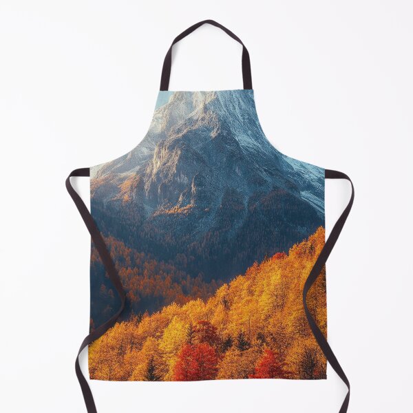 Item preview, Stunning autumn landscape with a snow-capped mountain towering over vibrant orange and red forests at sunset. designed and sold by Jerhus.