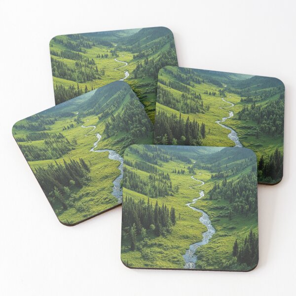 Item preview, Green valley with a meandering river surrounded by majestic mountains during the day. designed and sold by Jerhus.