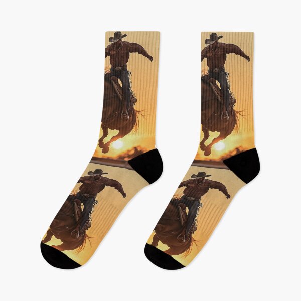 Item preview, Rodeo rider cowboy mid air sunset backdrop Active Outdoors Inspired Art designed and sold by CDC40.