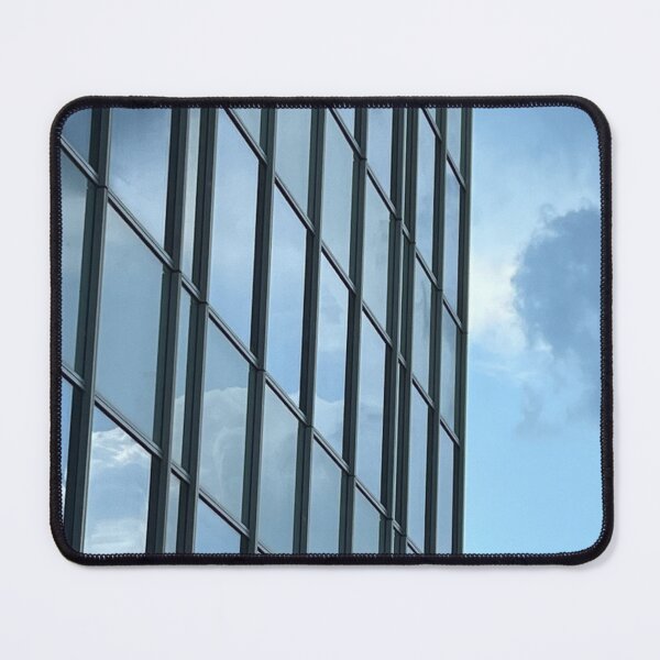 Item preview, Reflective Skyscraper with Clouds – Minimalist Urban Art Print designed and sold by BeaconMarketing.