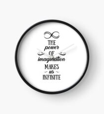 The power of imagination makes us infinite - Black version Clock