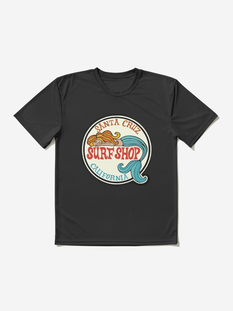Aperçu 2 sur 7. T-shirt respirant avec l'œuvre Santa Cruz Surf Shop - Autocollant avec logo de sirène de surf vintage de Californie créée et vendue par Kludoman.