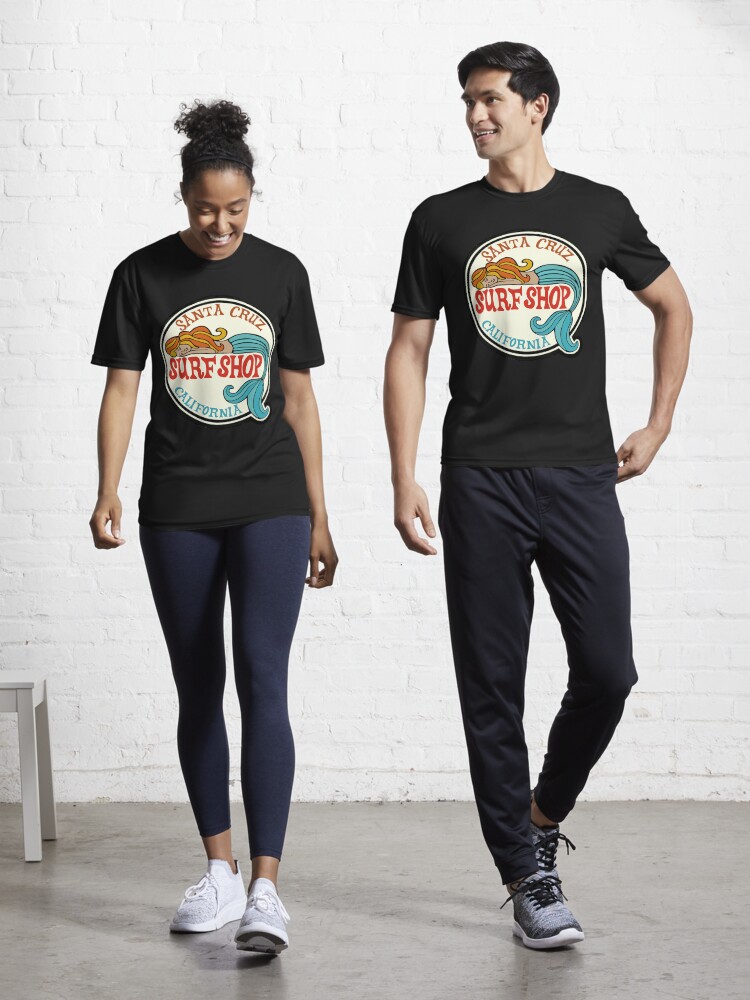 Aperçu 1 sur 7. T-shirt respirant avec l'œuvre Santa Cruz Surf Shop - Autocollant avec logo de sirène de surf vintage de Californie créée et vendue par Kludoman.