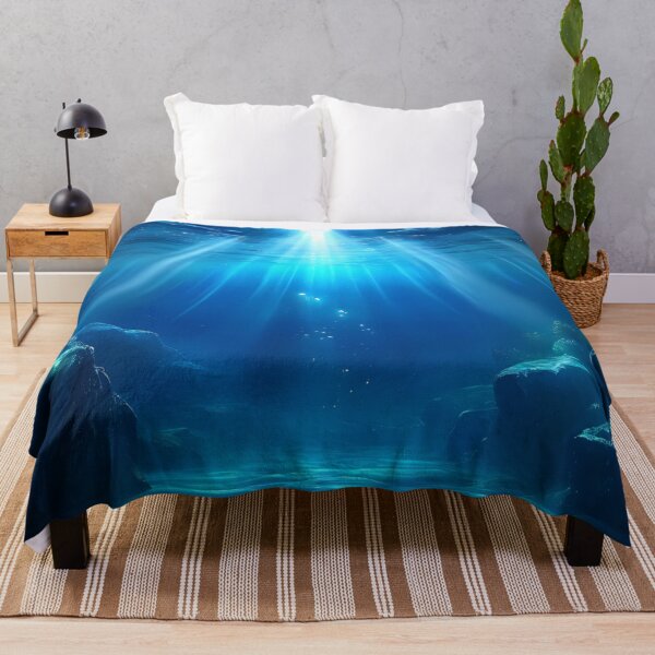 Item preview, Sunlight beams illuminating the tranquil underwater scene in a calm ocean designed and sold by aminz4.