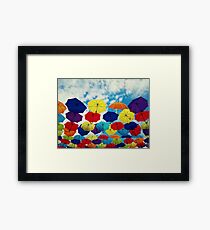 the floating umbrellas Framed Print