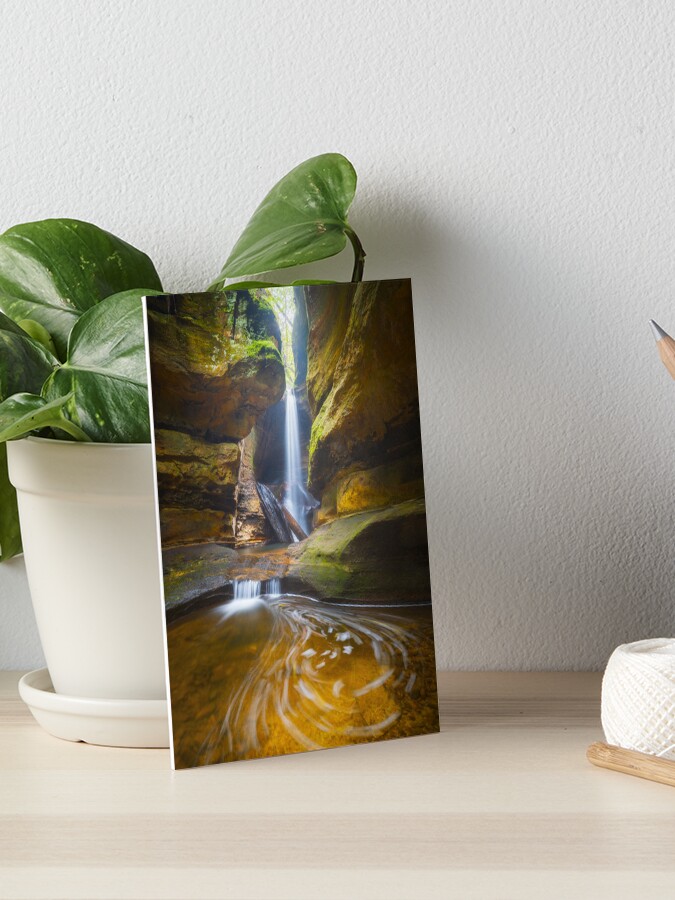 Thumbnail 1 of 2, Art Board Print, Centennial Glen Grotto, Blackheath, Blue Mountains, New South Wales, Australia designed and sold by Chockstone.