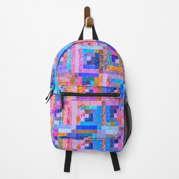 Item preview, DANCE OF PINK AND BLUE  IN LOG CABIN QUILT designed and sold by Jean Gregory Evans.