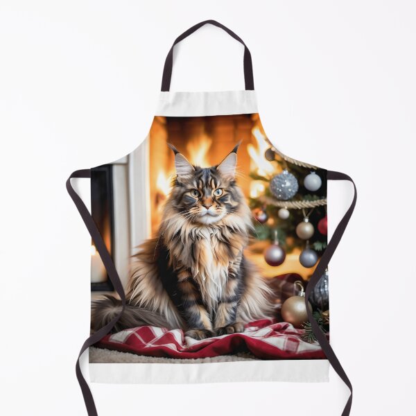 Item preview, A beautiful tortoiseshell Maine Coon cat surrounded by Christmas decorations and a Xmas tree. designed and sold by Kaleddis.