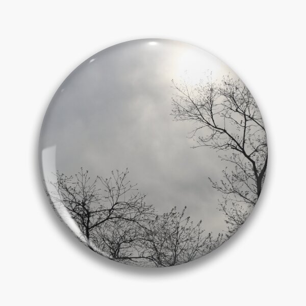 Item preview, Dark black and brown bare tree silhauette against cloudy grey sky and white sun overcast designed and sold by Jacobs-Media.
