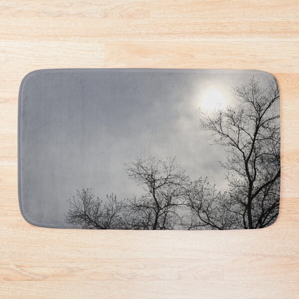 Item preview, Dark black and brown bare tree silhauette against cloudy grey sky and white sun overcast designed and sold by Jacobs-Media.