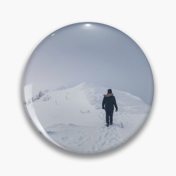 Item preview, man walking on snowy mountain designed and sold by skalihm.
