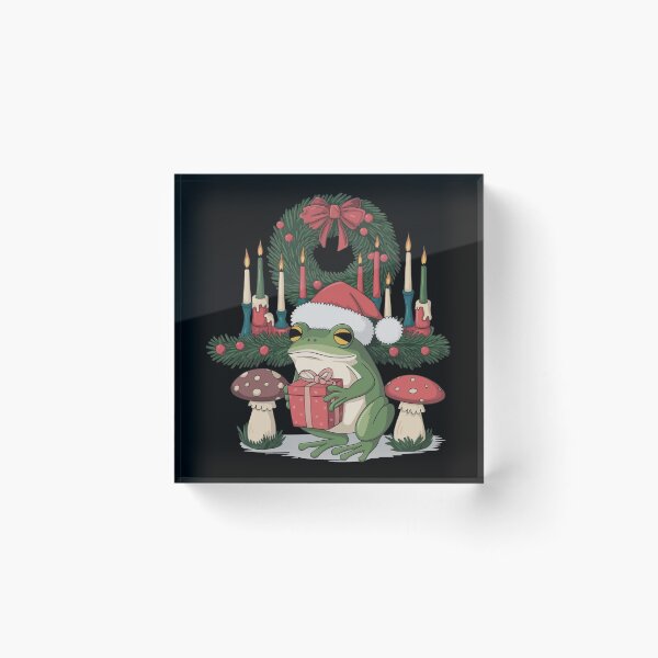 Item preview, Cottagecore Aesthetic Frog Between Mushrooms Wearing Christmas Hat  designed and sold by thespecialtyhub.