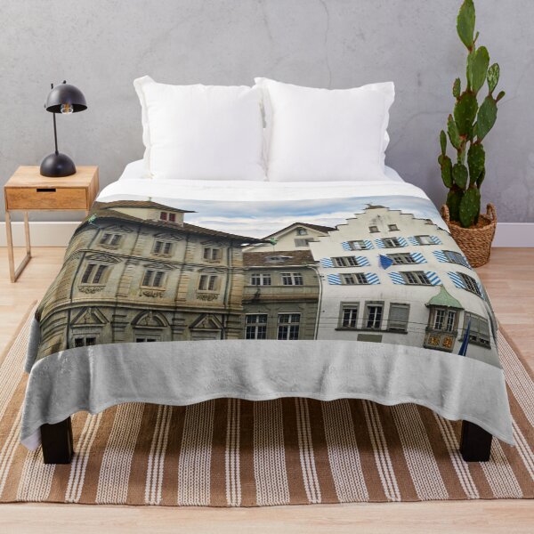 Item preview, An old house with a deer statue on the roof in Zurich Switzerland designed and sold by goceris.