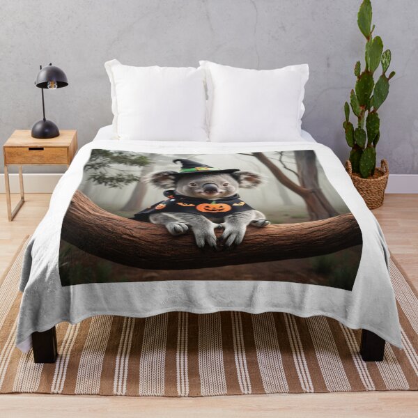 Item preview, Cute Halloween koala with witch hat and pumpkin cape in the mystical forest - perfect photo print for Halloween designed and sold by TRex-Landscapes.