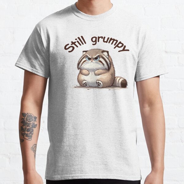 Vista previa del artículo con la obra «Gruñón Fluffy Manul - Todavía gruñón», diseñado y vendido por Marichkaart.