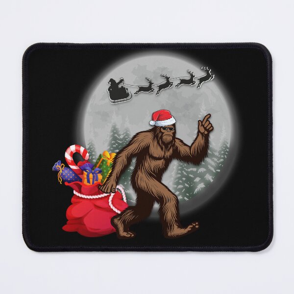 Item preview, Santa's Big Helper Bigfoot in a Santa Hat under the moonlight designed and sold by OhBoyLoveIt.