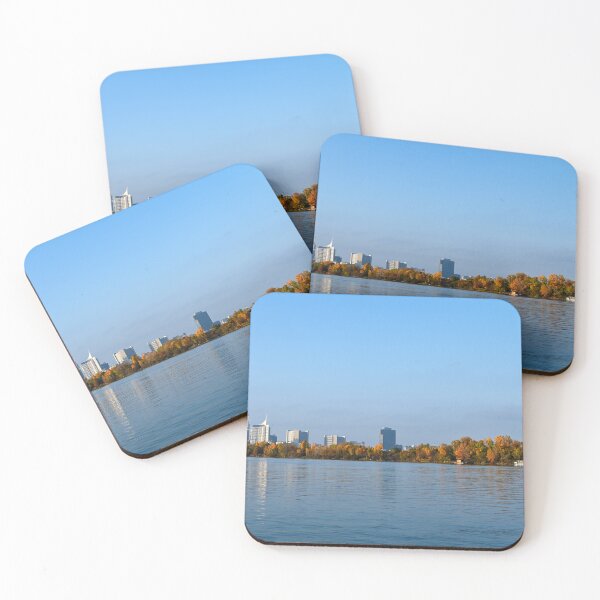 Item preview, Skyline of Vienna and blue Donau river, autumn season  designed and sold by goceris.
